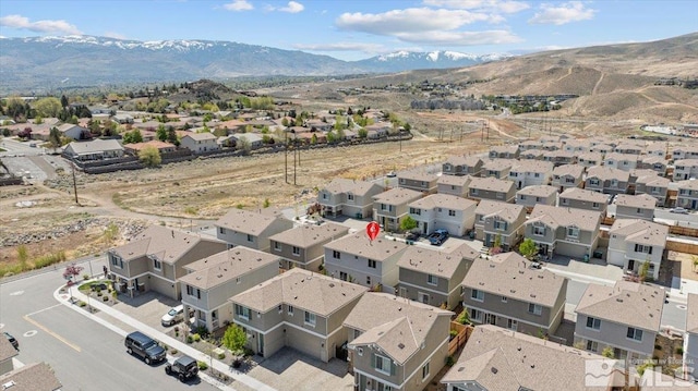 aerial view featuring a residential view and a mountain view