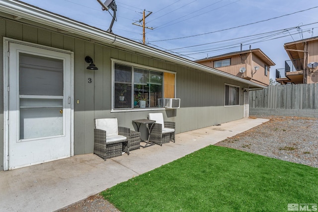 exterior space with fence and cooling unit