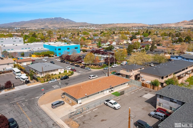 drone / aerial view featuring a mountain view