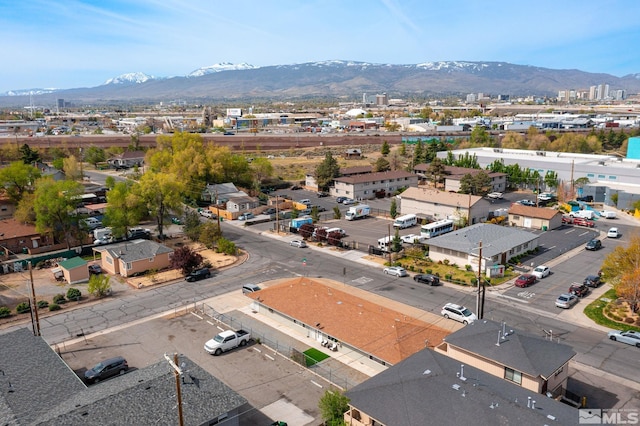 bird's eye view with a mountain view