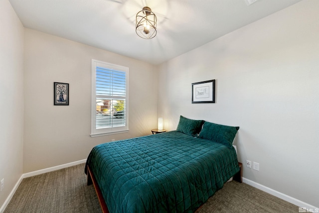 carpeted bedroom with baseboards