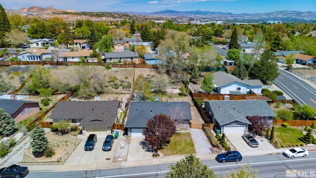 aerial view with a residential view and a mountain view