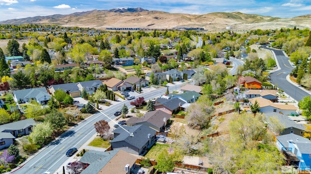 drone / aerial view with a residential view and a mountain view