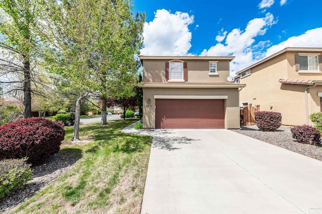 traditional-style home with an attached garage, stucco siding, a front yard, and concrete driveway