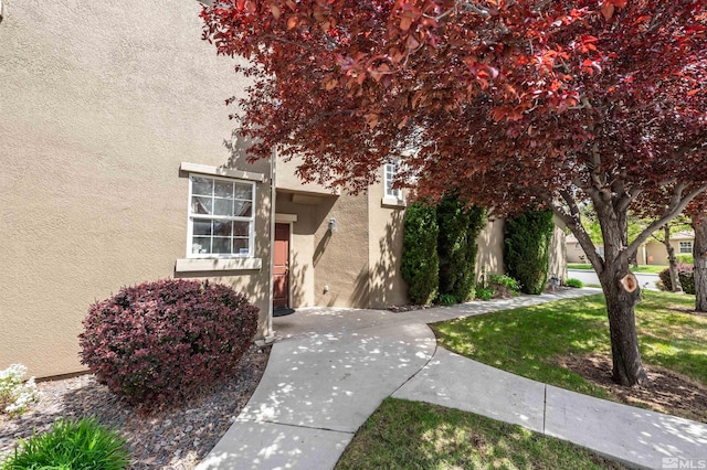 exterior space featuring stucco siding