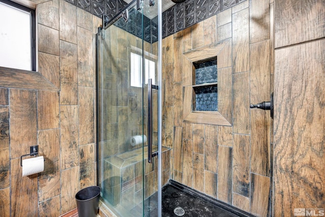 bathroom with a shower stall