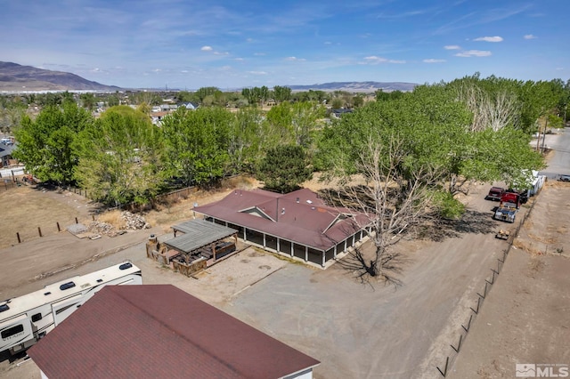 drone / aerial view featuring a mountain view