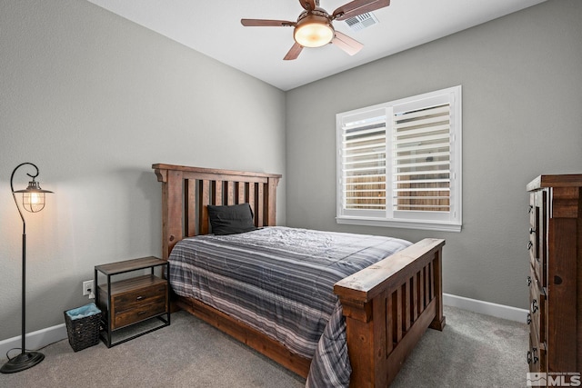 bedroom featuring carpet flooring, a ceiling fan, baseboards, and visible vents