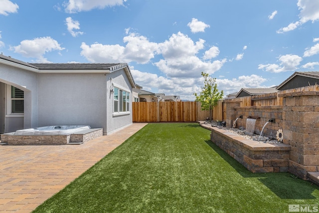 view of yard with a fenced backyard and a patio area