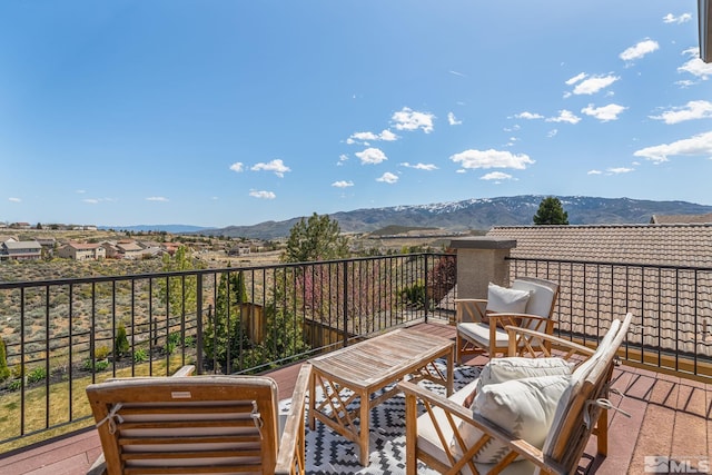 balcony featuring a mountain view