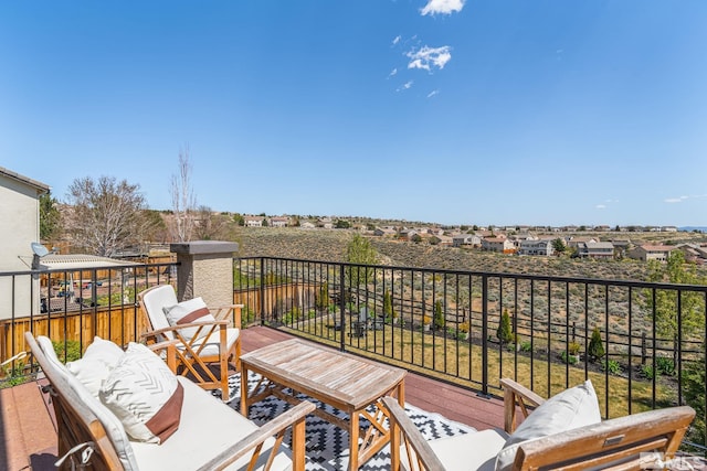 balcony featuring a residential view