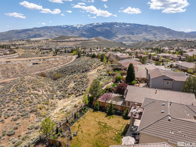 bird's eye view with a residential view and a mountain view