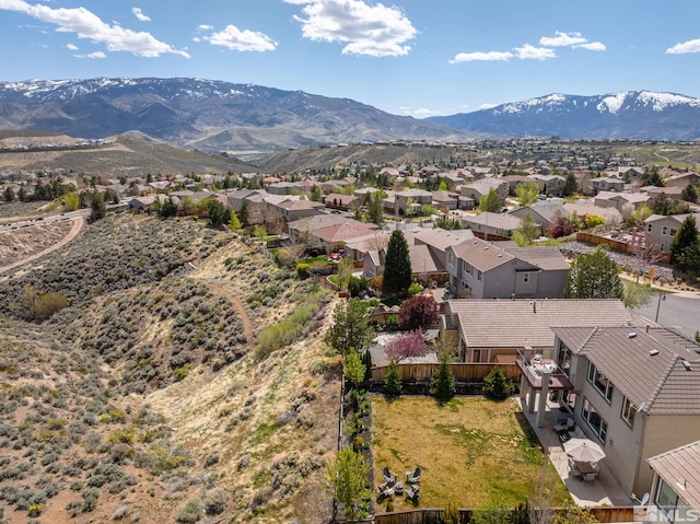 birds eye view of property with a residential view and a mountain view