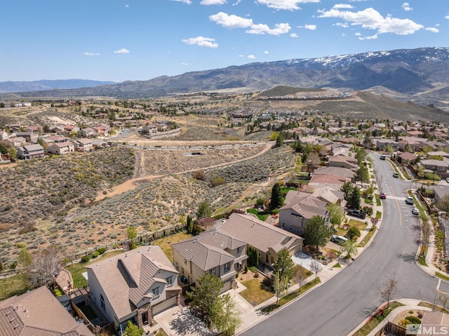 bird's eye view with a residential view and a mountain view