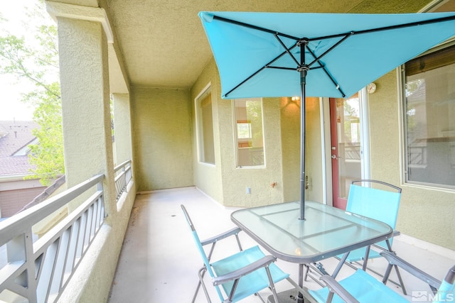 balcony featuring outdoor dining area