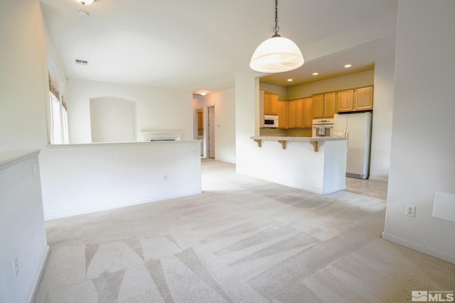 interior space featuring light colored carpet, recessed lighting, baseboards, and visible vents