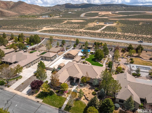 drone / aerial view featuring a mountain view