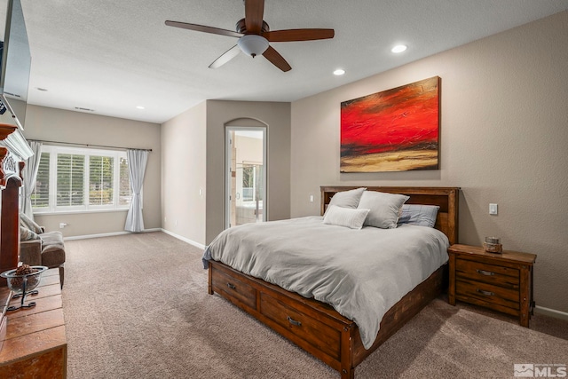 bedroom featuring baseboards, carpet flooring, and recessed lighting