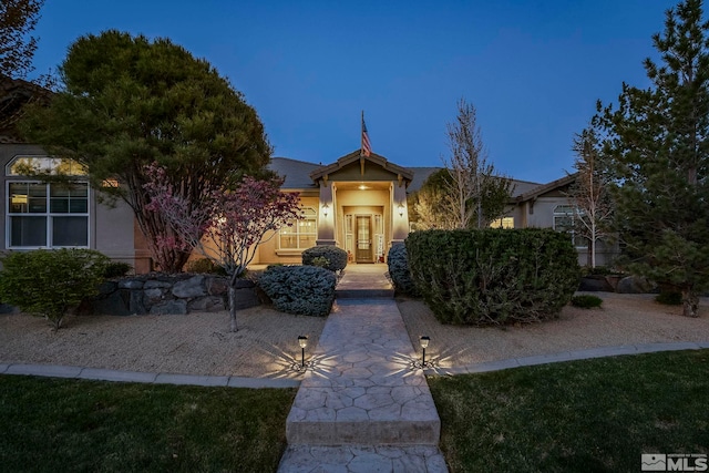 view of front of house with stucco siding