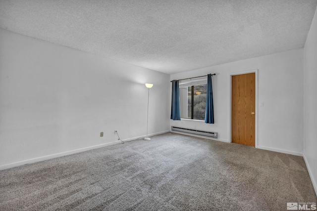 carpeted empty room with baseboards, a baseboard heating unit, and a textured ceiling