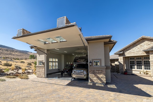 exterior space featuring a mountain view