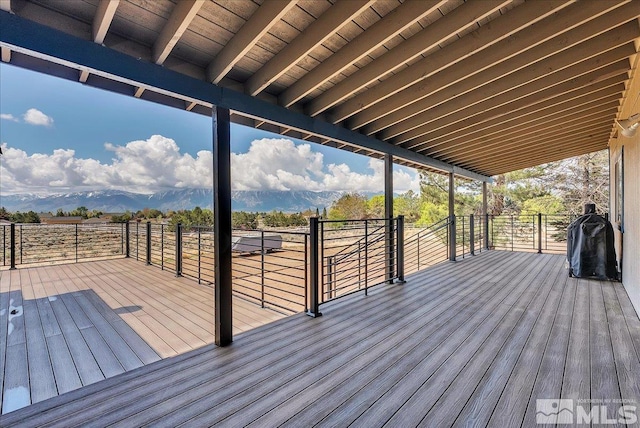 deck with a mountain view