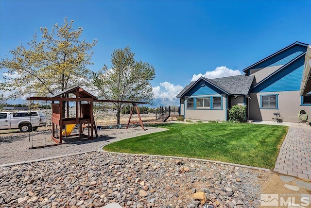 view of yard with a playground