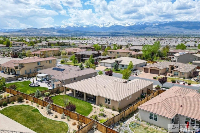 bird's eye view featuring a mountain view and a residential view
