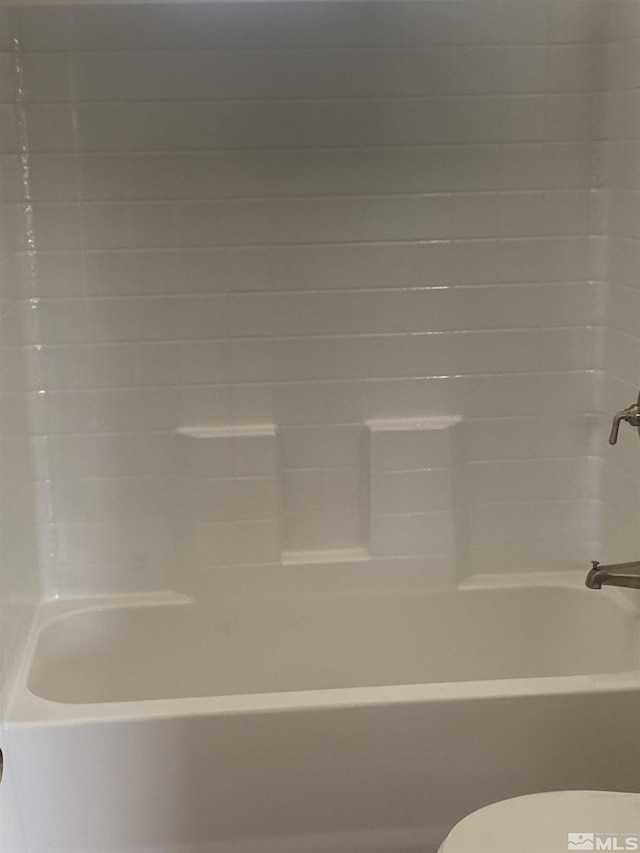 full bathroom with shower / washtub combination