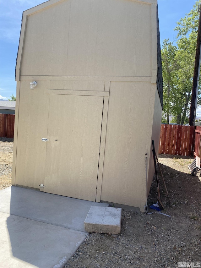 view of shed featuring a fenced backyard