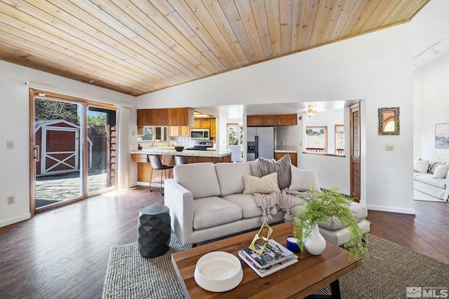 living area featuring baseboards, vaulted ceiling, wood ceiling, and dark wood finished floors