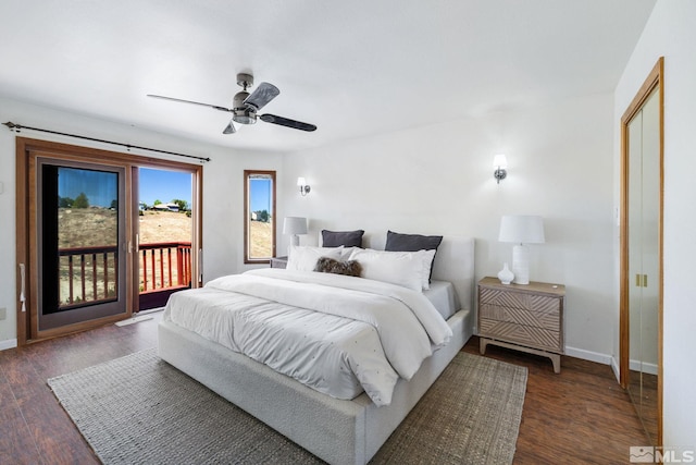 bedroom featuring baseboards, access to outside, a ceiling fan, and wood finished floors