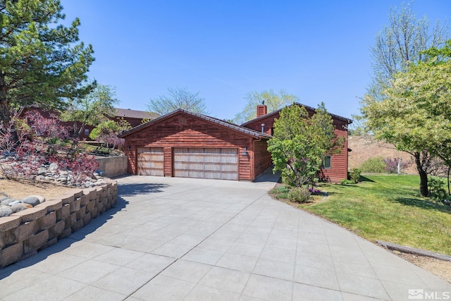 log home with an attached garage, a front lawn, a chimney, and concrete driveway