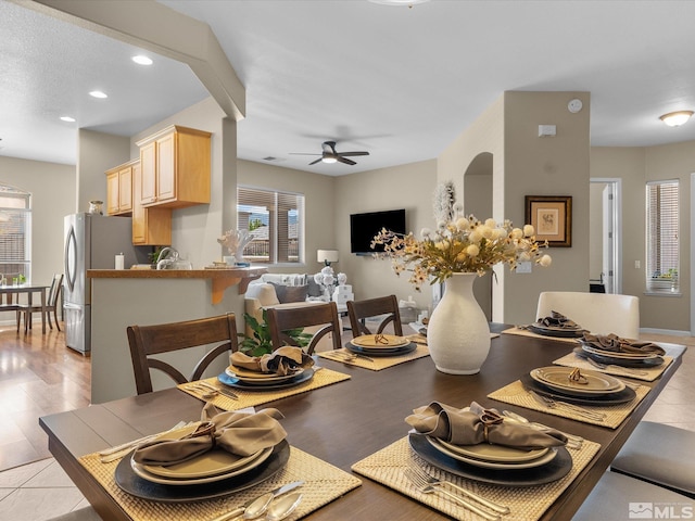 dining room with a ceiling fan and recessed lighting