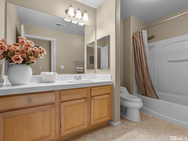 bathroom with visible vents, tile patterned flooring, vanity, toilet, and shower / bath combo with shower curtain