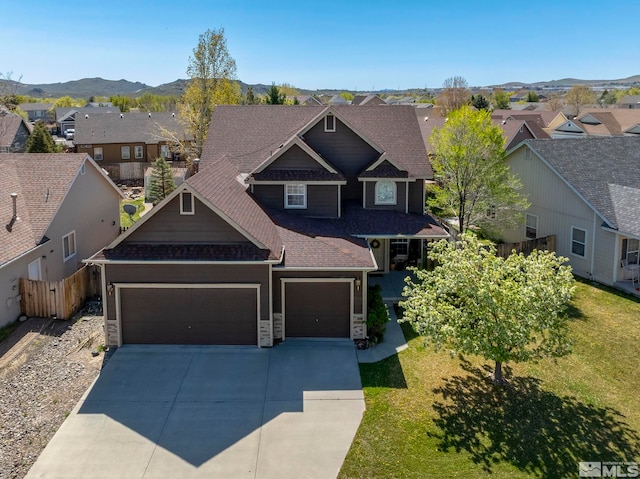 craftsman house with a garage, stone siding, roof with shingles, driveway, and a residential view