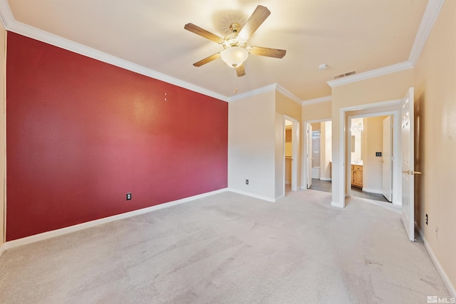 unfurnished bedroom with crown molding, ceiling fan, light colored carpet, baseboards, and visible vents