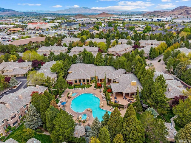 birds eye view of property featuring a mountain view