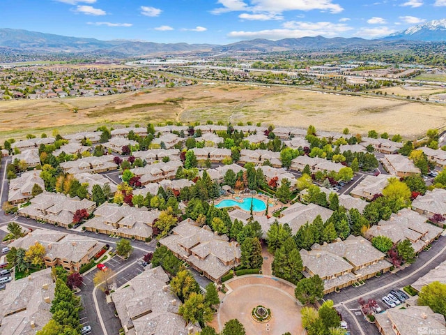 bird's eye view featuring a mountain view and a residential view