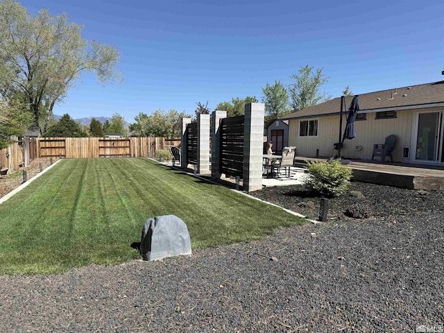 view of yard featuring a fenced backyard and a patio area