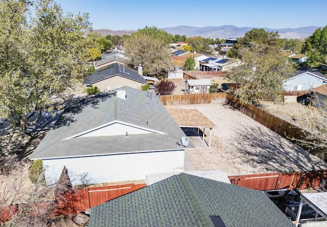 birds eye view of property featuring a mountain view
