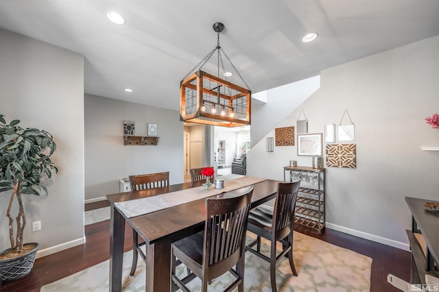 dining area with recessed lighting, baseboards, and hardwood / wood-style flooring