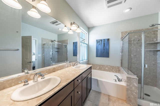 bathroom with a sink, a shower stall, a bath, and visible vents