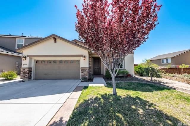 view of front of house featuring fence, an attached garage, a front lawn, stucco siding, and driveway