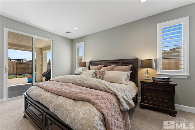 bedroom featuring access to exterior, visible vents, baseboards, light carpet, and recessed lighting