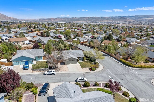 bird's eye view with a residential view and a mountain view