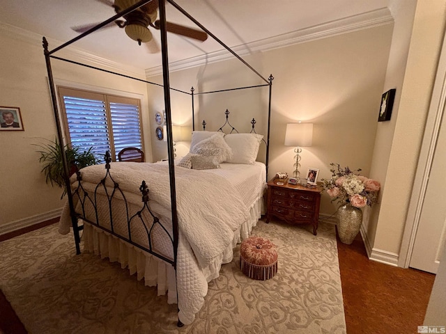 bedroom with crown molding, baseboards, and ceiling fan