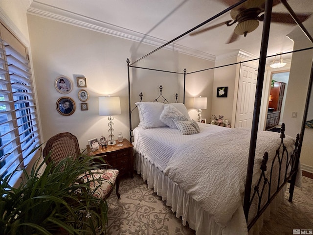 bedroom with a closet, ornamental molding, and ceiling fan