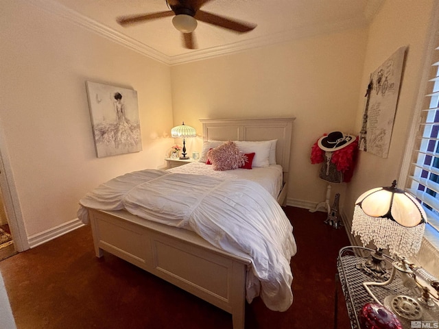 bedroom with crown molding, baseboards, ceiling fan, and dark carpet