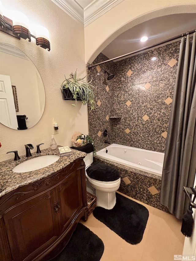 full bath featuring vanity, ornamental molding, tiled shower / bath, and toilet